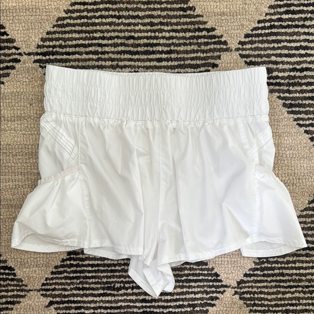 FP Movement by Free People White Athletic Shorts with Ruffled Design